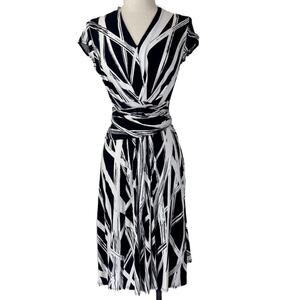 DONATING! LAST CHANCE! 
David Meister faux wrap dress, small black white midi